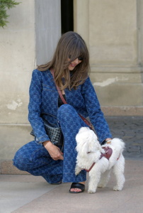 Young woman with a white dog